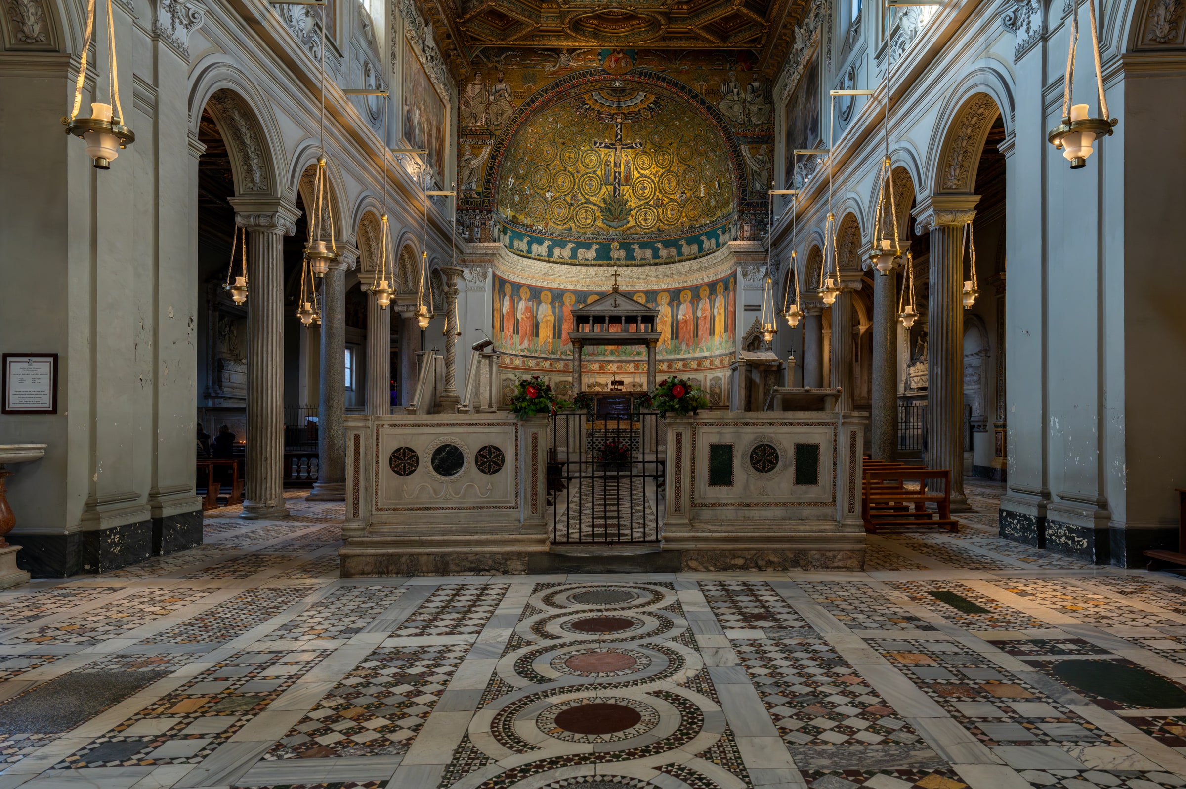 The nave, schola cantorum, apse mosaic, and sanctuary of the Basilica of San Clemente in Rome.