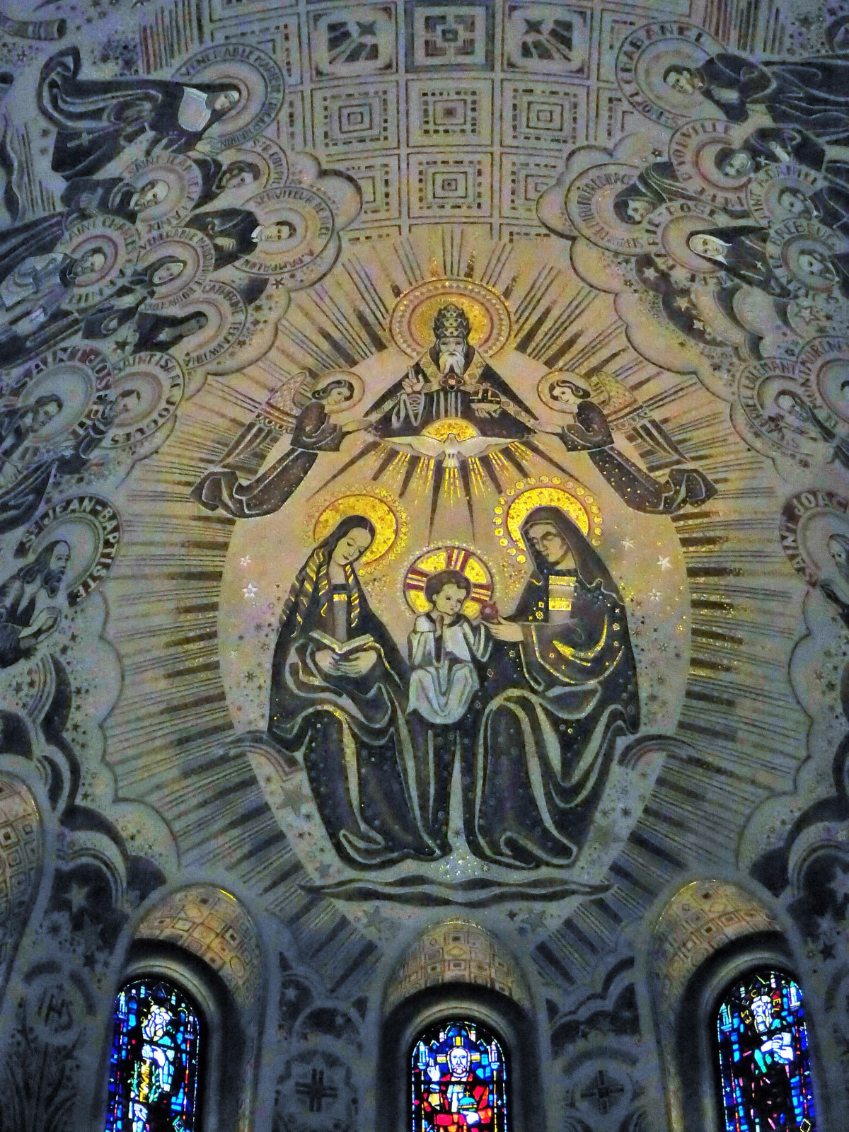 The choir-vault mosaic honoring St. Anne inside the Basilica of Sainte-Anne-de-Beaupré in Quebec.