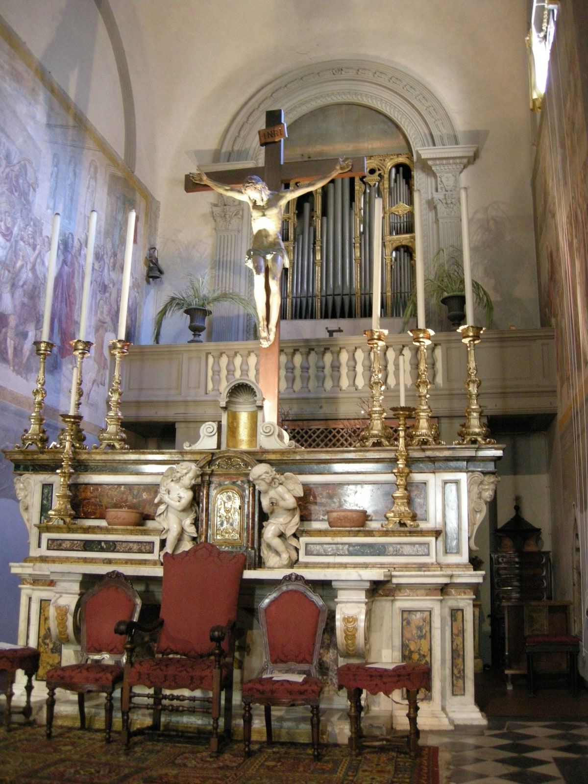 The high altar and sanctuary inside the Church of Sant’Ambrogio in Florence.