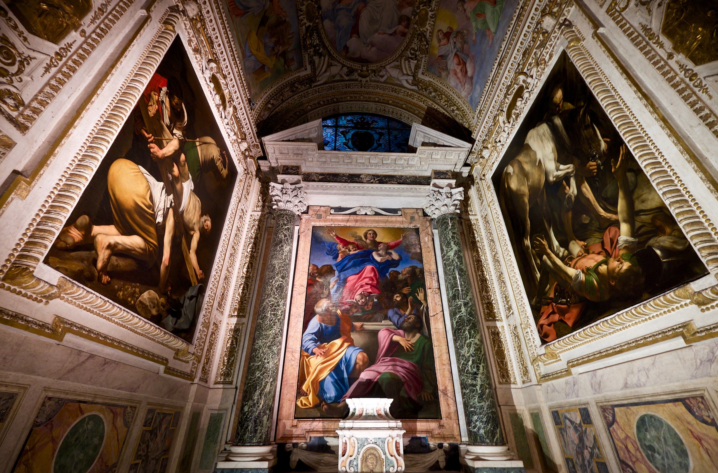 The Cerasi Chapel in Santa Maria del Popolo, with Carracci’s Assumption above the altar between Caravaggio’s paintings of Saint Peter and Saint Paul.
