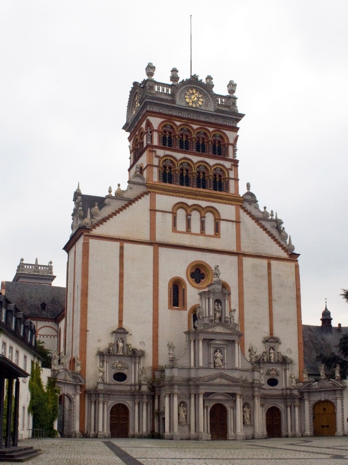 The Romanesque facade of St. Matthias Abbey in Trier, Germany.