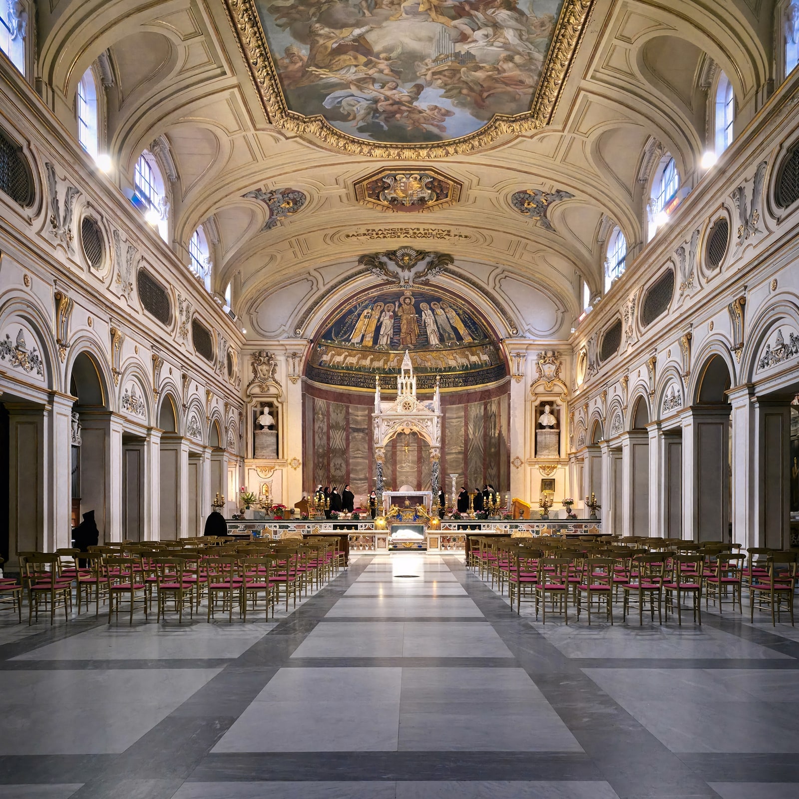 The nave and sanctuary of the Basilica of Santa Cecilia in Trastevere, Rome.