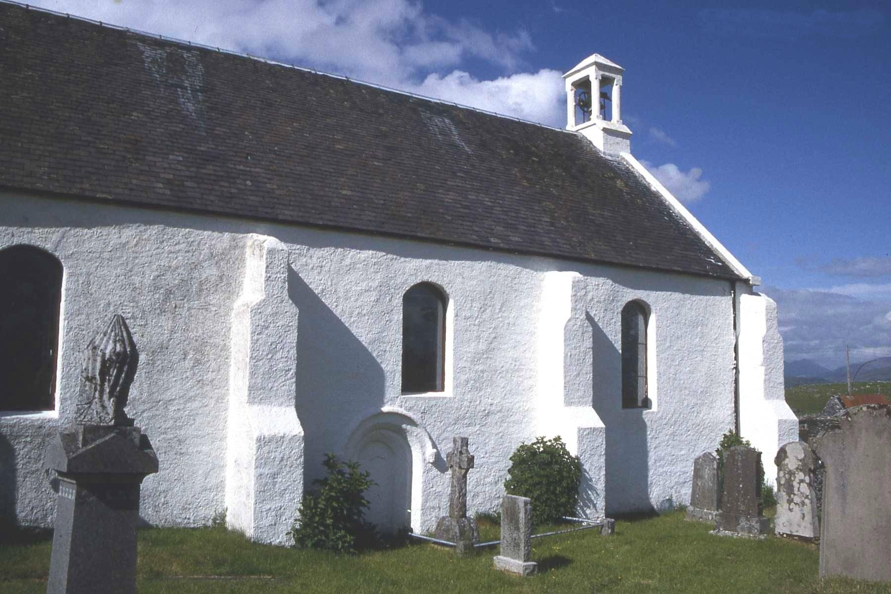 The stone Cathedral Church of St. Moluag amid the churchyard on the Isle of Lismore, Scotland.