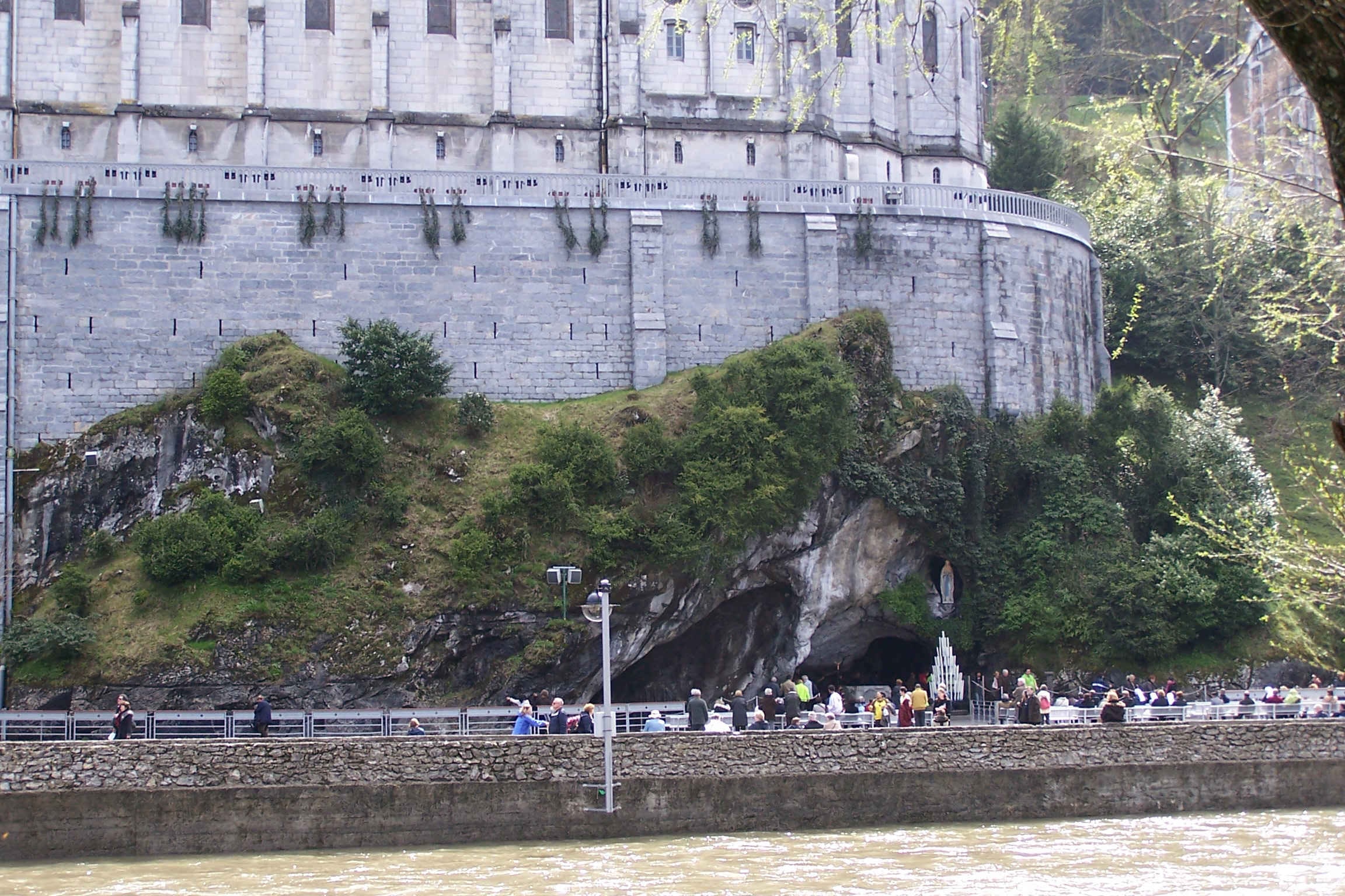 The Grotto of Massabielle and basilicas at the Sanctuary of Our Lady of Lourdes in France.