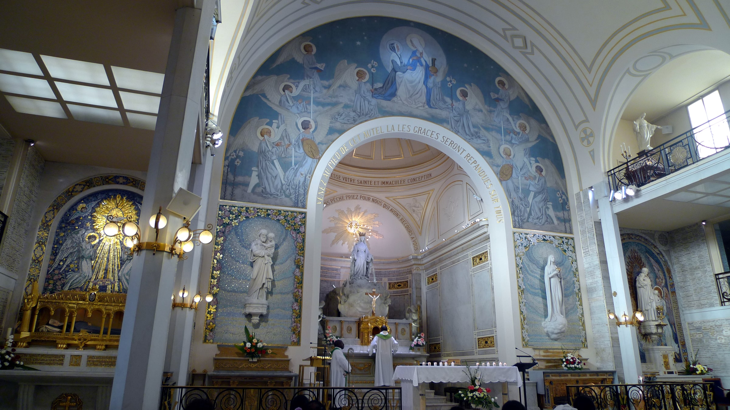 The luminous interior of the Chapel of Our Lady of the Miraculous Medal on Rue du Bac in Paris.
