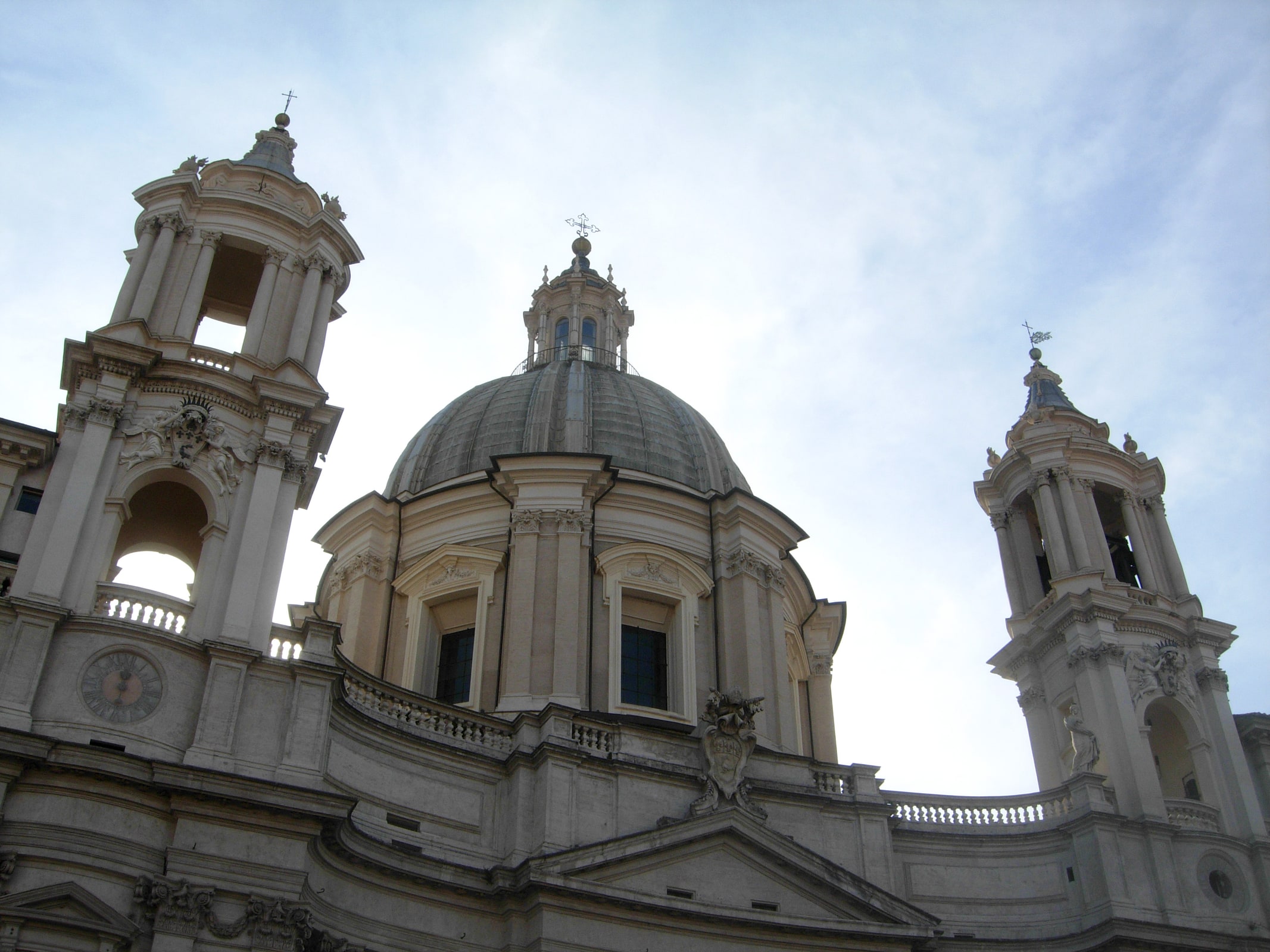 The Baroque dome and twin bell towers of Sant’Agnese in Agone rising above Piazza Navona in Rome.